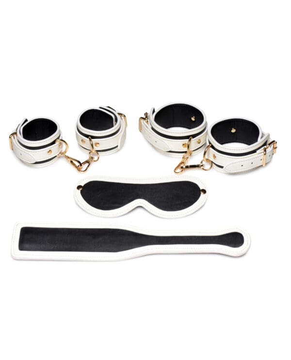 Master Series Kink in the Dark Glowing Cuffs & Blindfold & Paddle Set - Image 2
